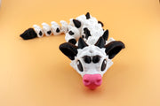 Articulated Cow Dragon Figurine: Flexible Farmyard Fantasy Creature Collectible