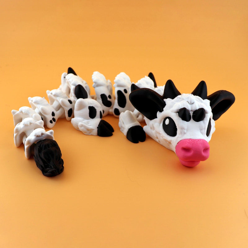 Articulated Cow Dragon Figurine: Flexible Farmyard Fantasy Creature Collectible